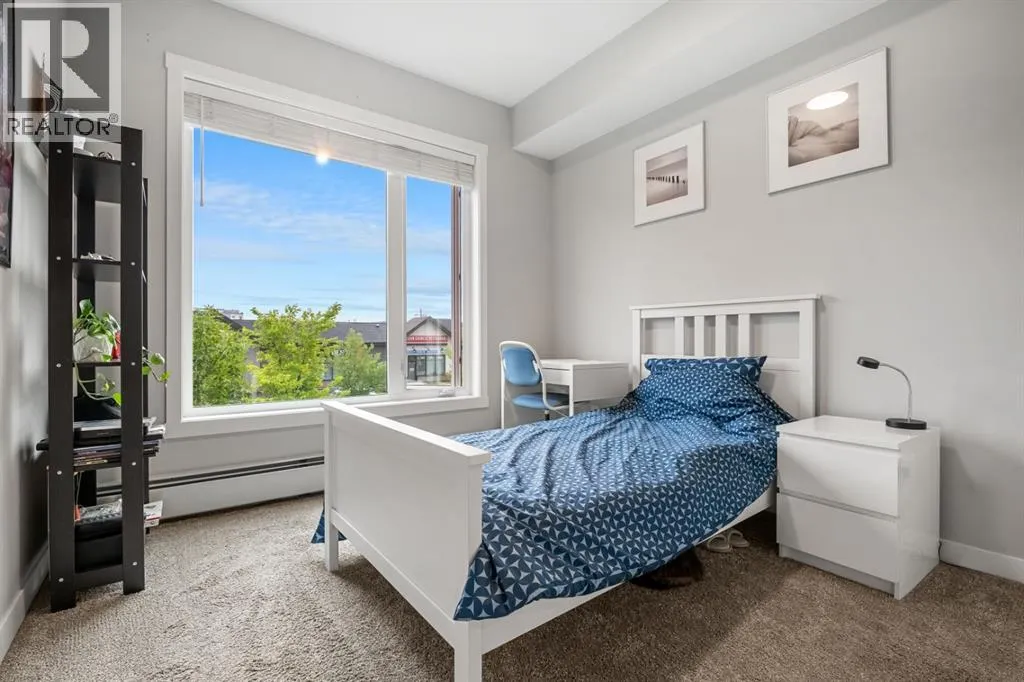 205, 150 Shawnee Square SW
