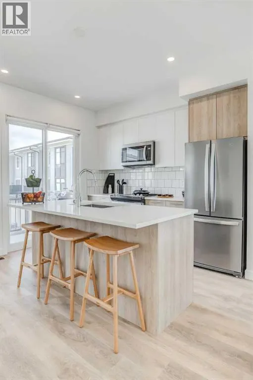#309, 857 Belmont Drive SW