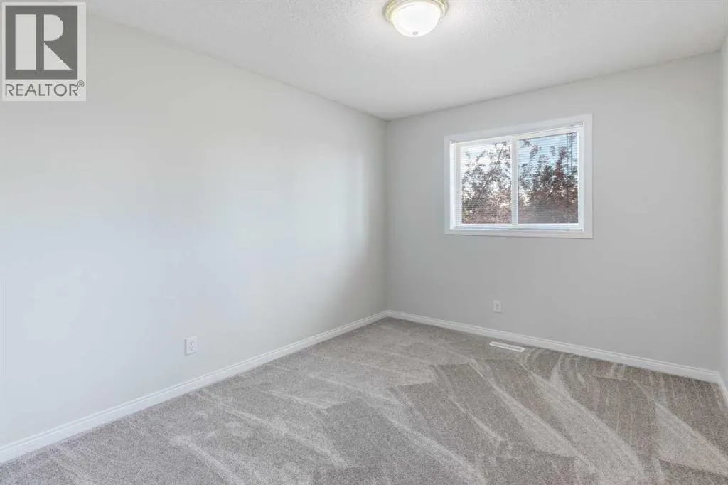26 Rocky Ridge Heights NW