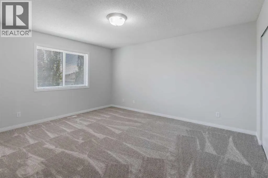 26 Rocky Ridge Heights NW