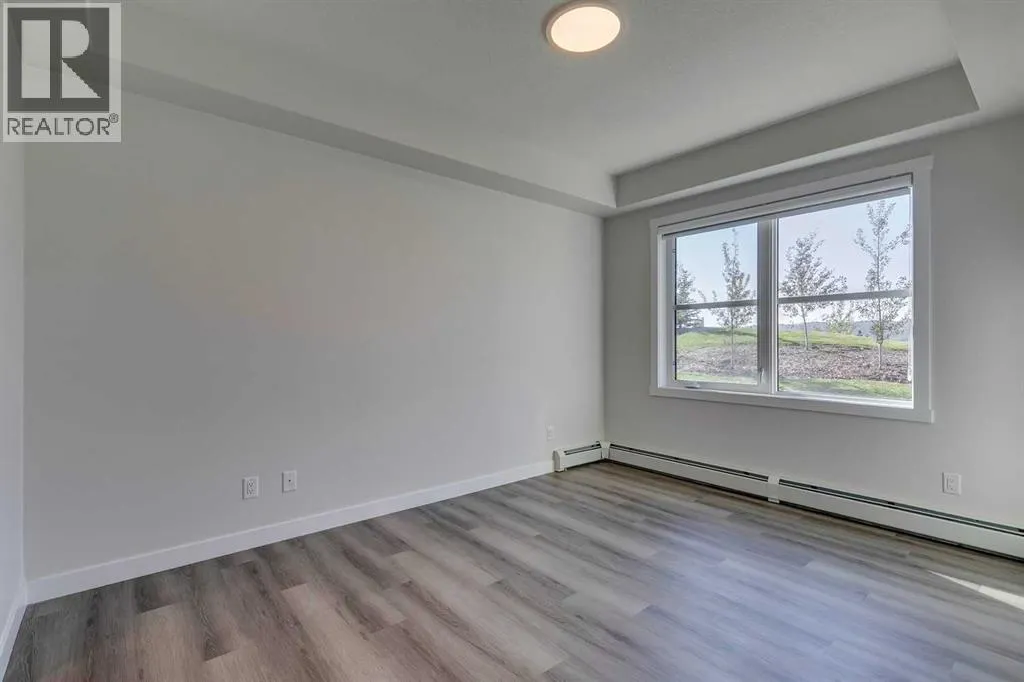113, 55 Wolf Hollow Crescent SE