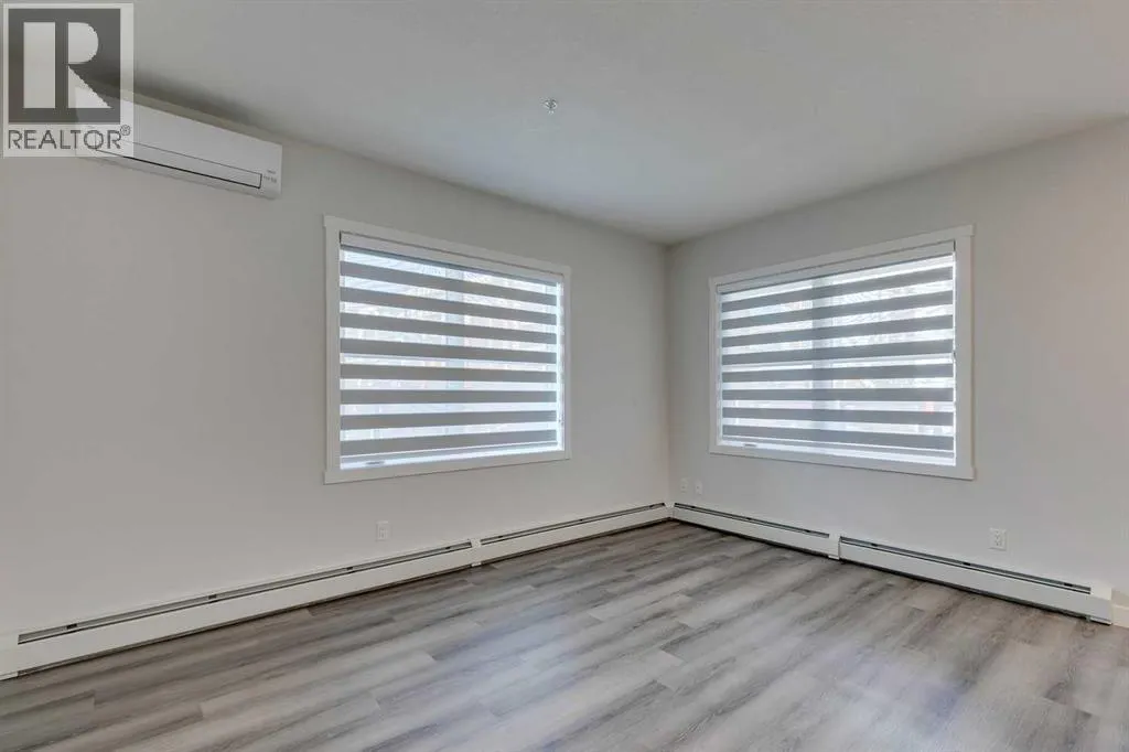 113, 55 Wolf Hollow Crescent SE