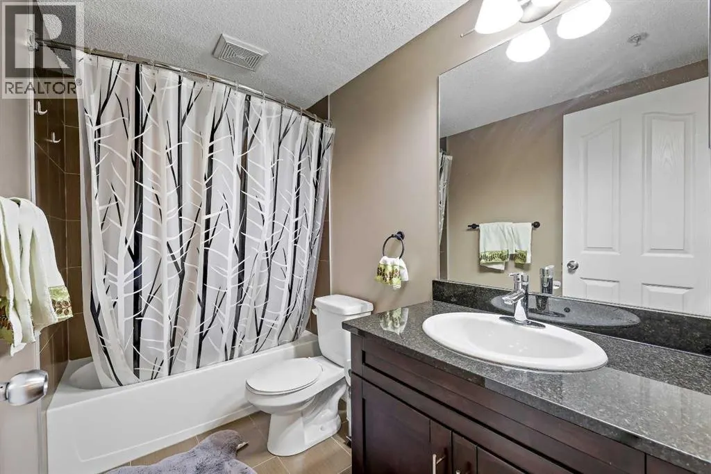 2212, 403 Mackenzie Way SW