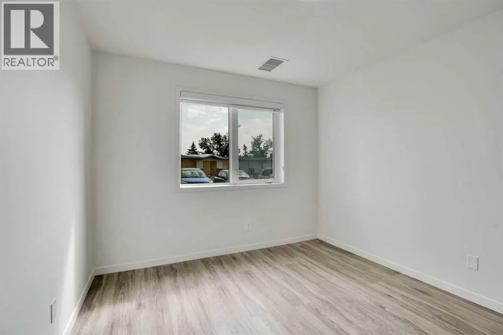 107, 300 Edwards Way NW