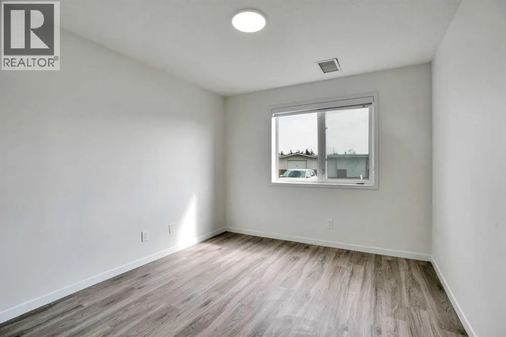 107, 300 Edwards Way NW