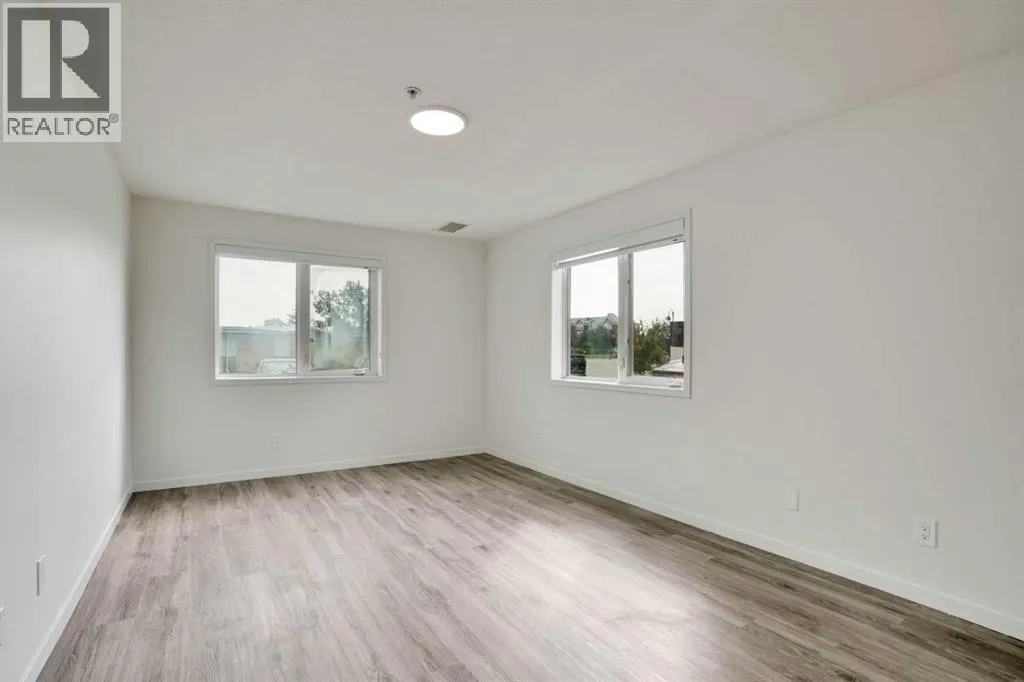 107, 300 Edwards Way NW
