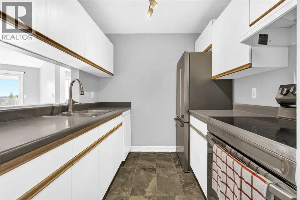 309, 10 Dover Point SE