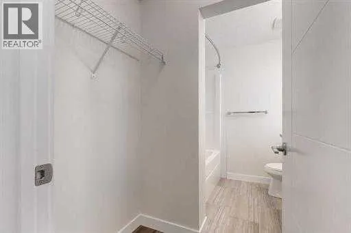 313, 12 Sage Hill Terrace NW