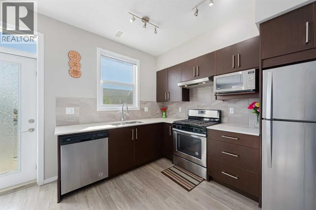 202, 515 Redstone Walk NE