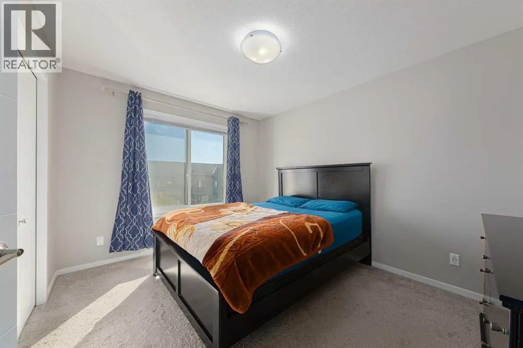 202, 515 Redstone Walk NE
