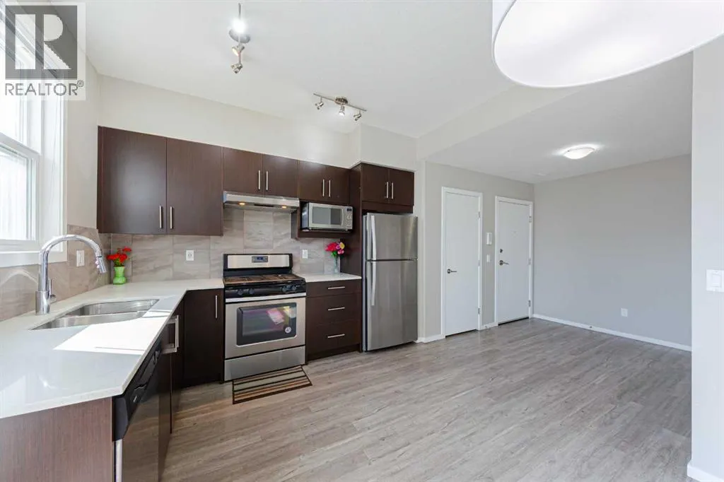 202, 515 Redstone Walk NE