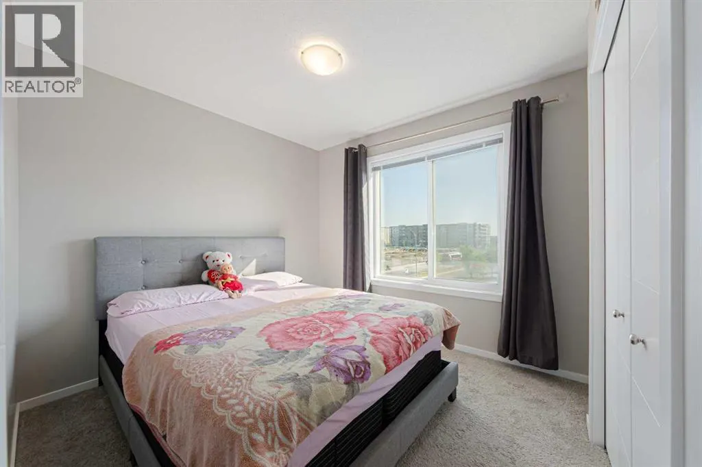202, 515 Redstone Walk NE