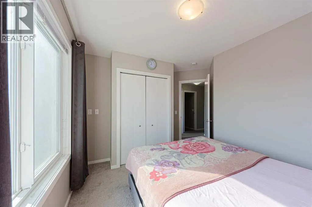 202, 515 Redstone Walk NE