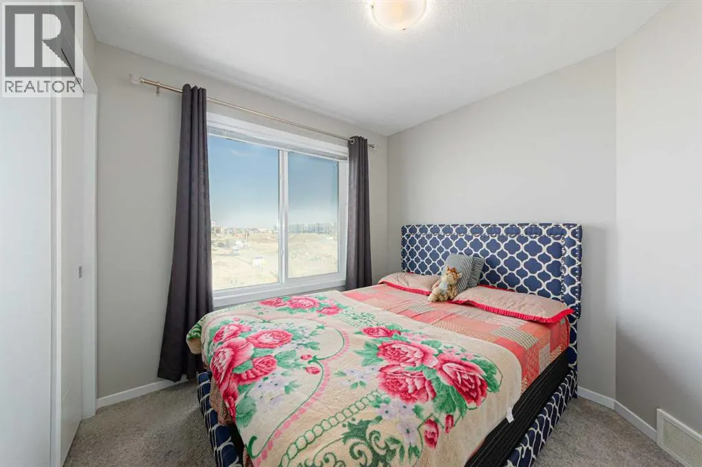 202, 515 Redstone Walk NE