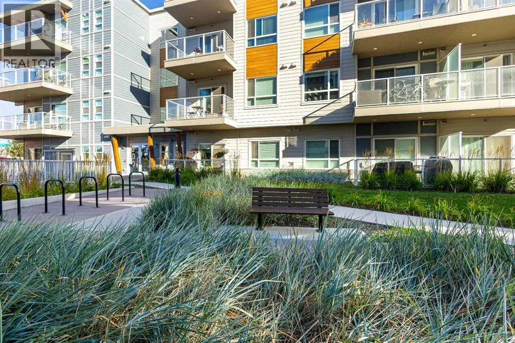 305, 100 Harvest Hills Place NE