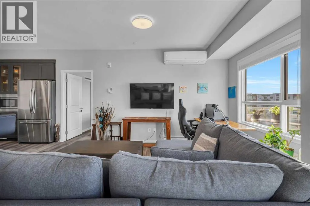 305, 100 Harvest Hills Place NE