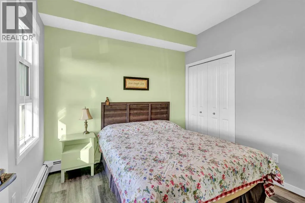 305, 100 Harvest Hills Place NE