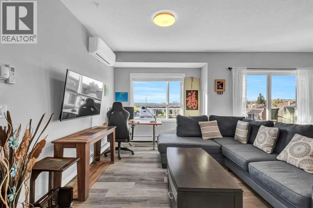 305, 100 Harvest Hills Place NE