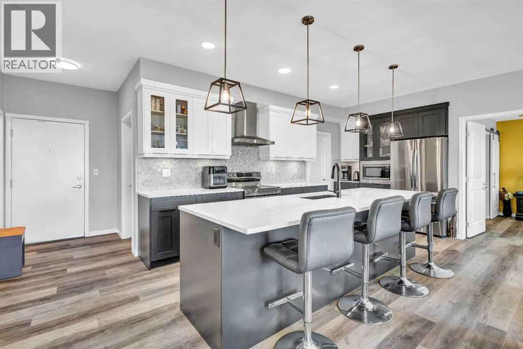 305, 100 Harvest Hills Place NE