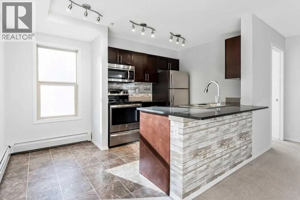9113, 403 Mackenzie Way SW