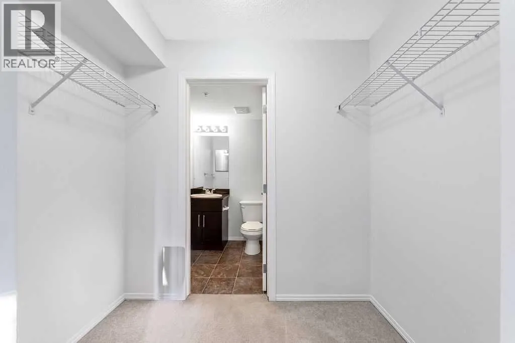 9113, 403 Mackenzie Way SW