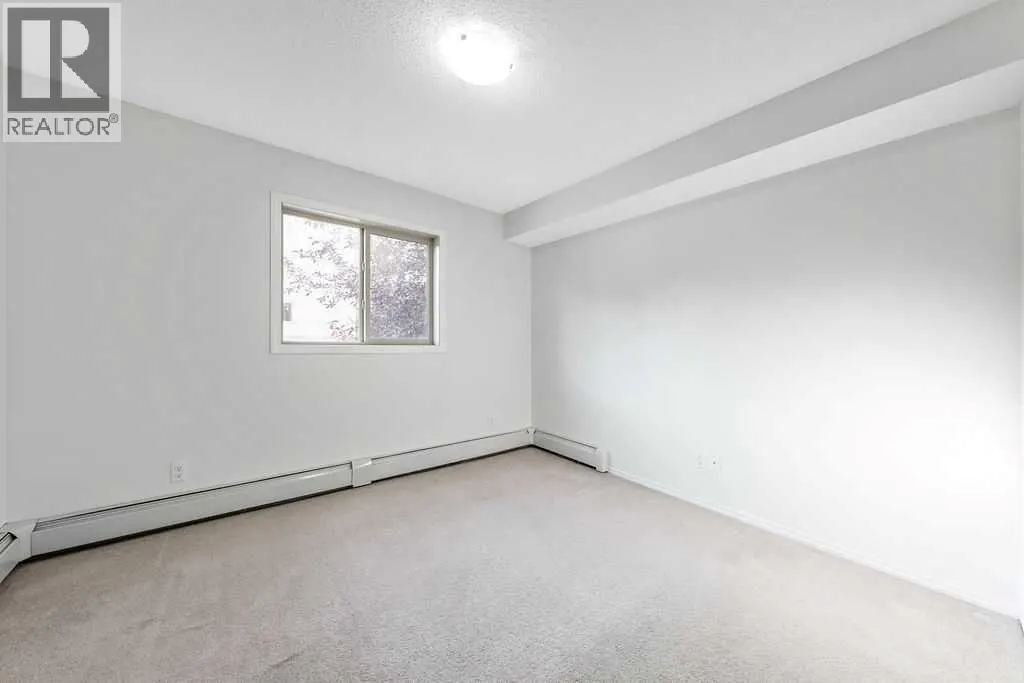 9113, 403 Mackenzie Way SW