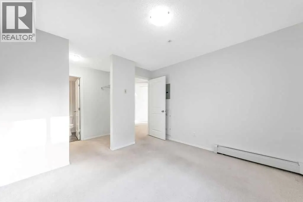 9113, 403 Mackenzie Way SW