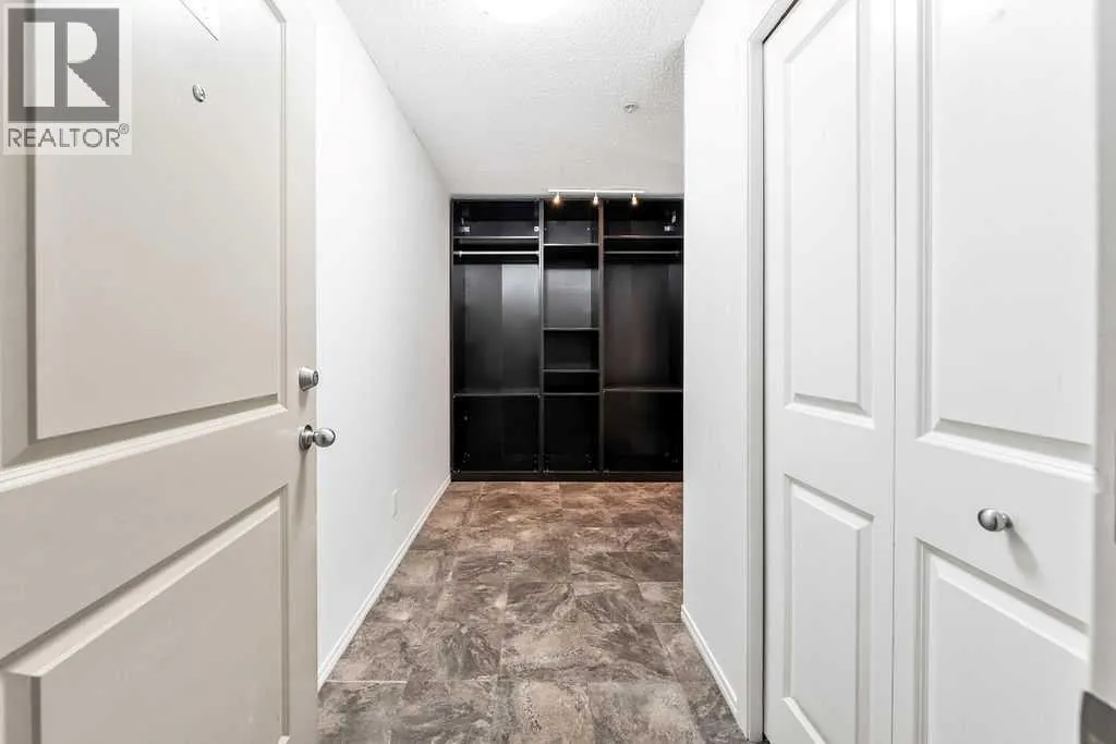 9113, 403 Mackenzie Way SW