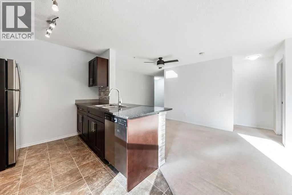 9113, 403 Mackenzie Way SW