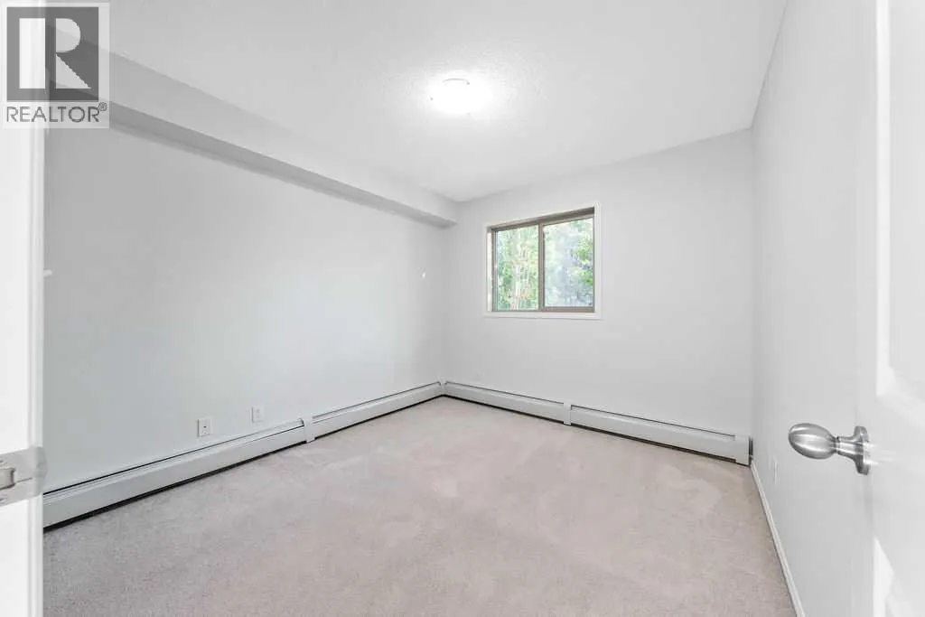 9113, 403 Mackenzie Way SW