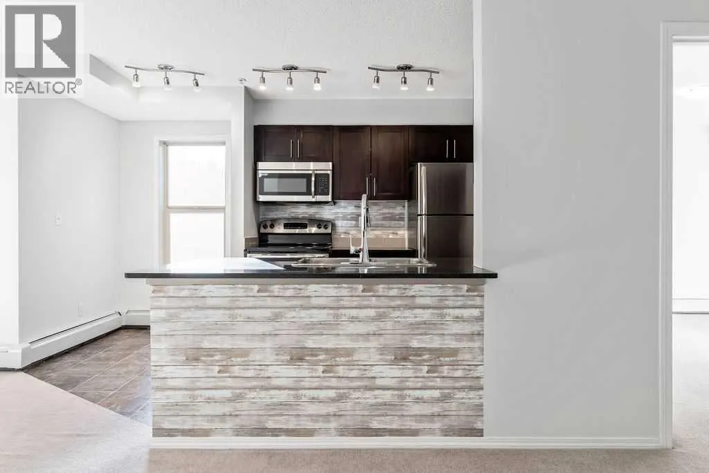 9113, 403 Mackenzie Way SW