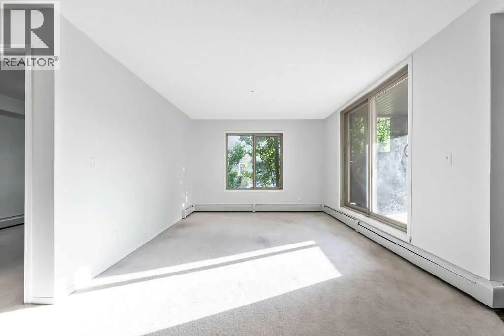 9113, 403 Mackenzie Way SW