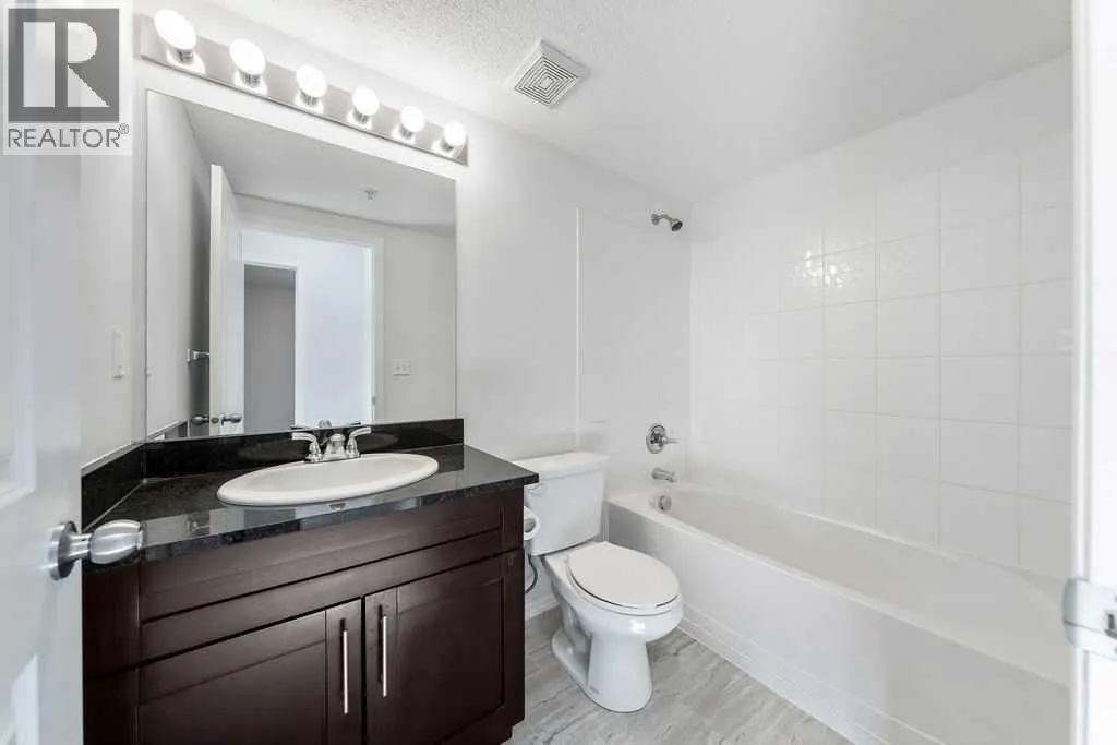 9113, 403 Mackenzie Way SW