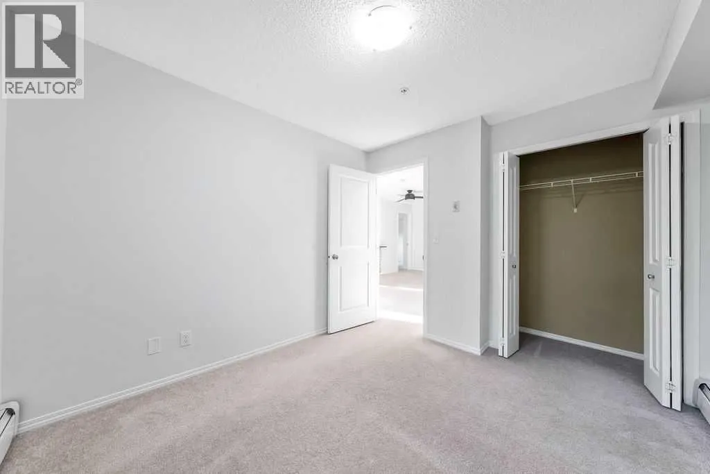 9113, 403 Mackenzie Way SW