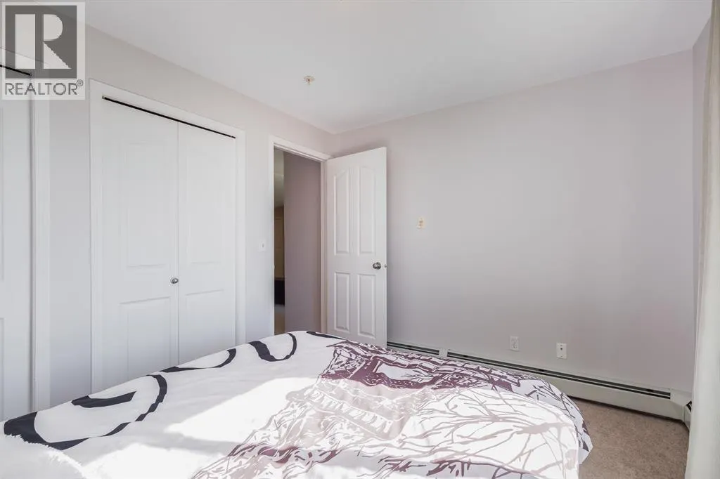 7308, 304 Mackenzie  SW