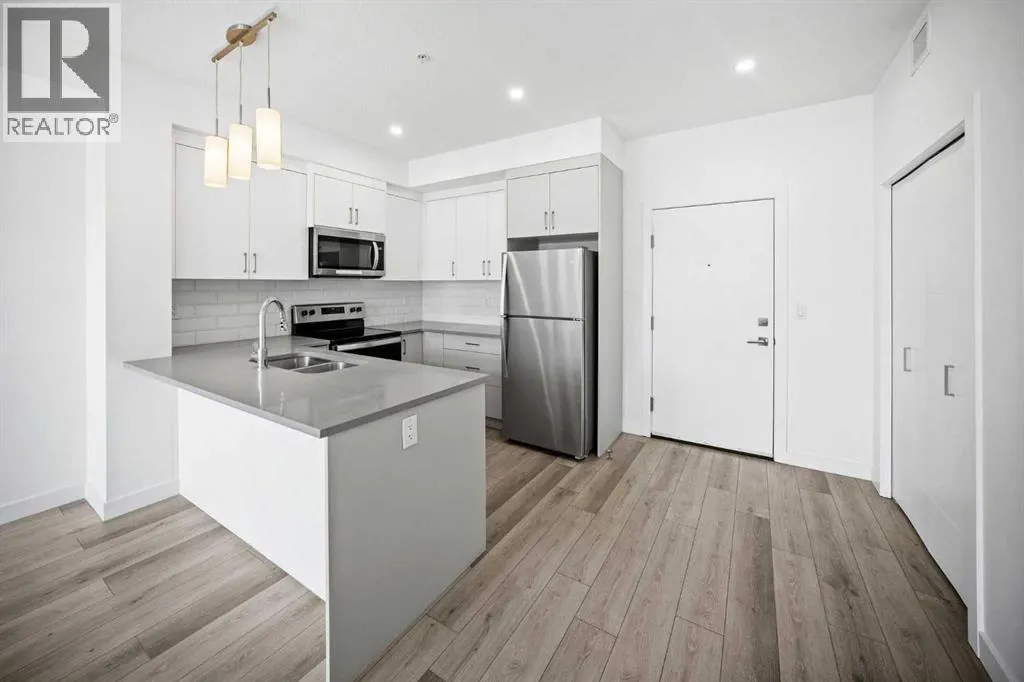 403, 205 Spring Creek Common SW