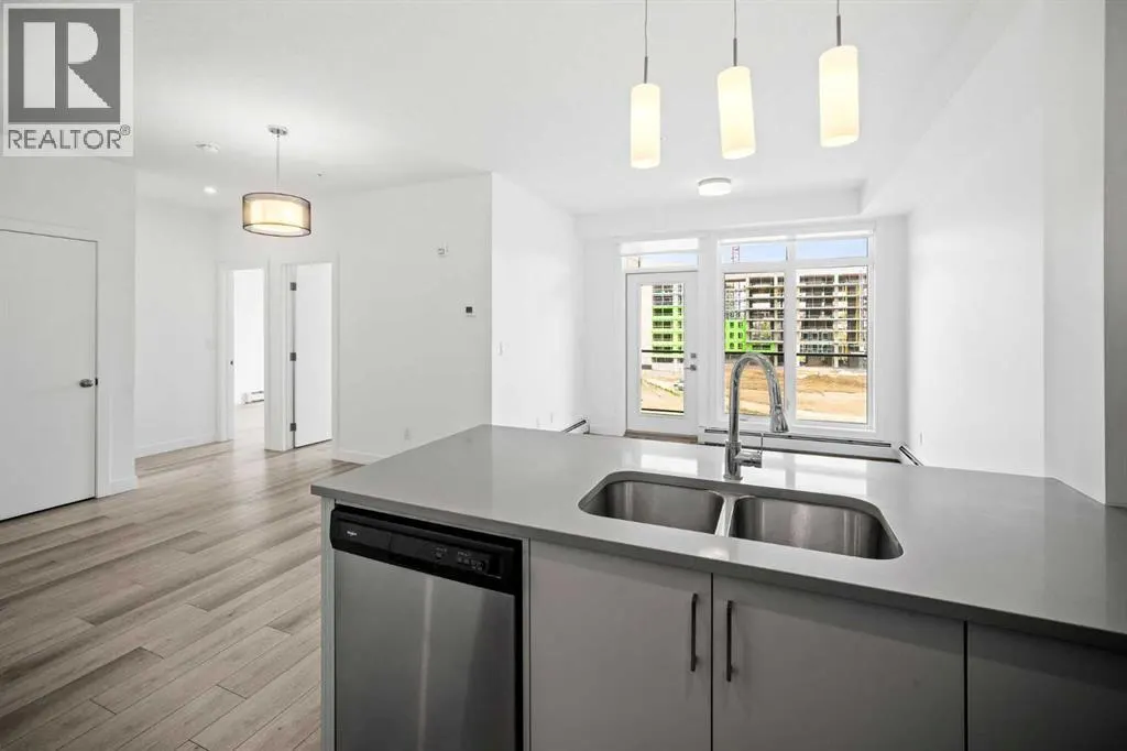 403, 205 Spring Creek Common SW