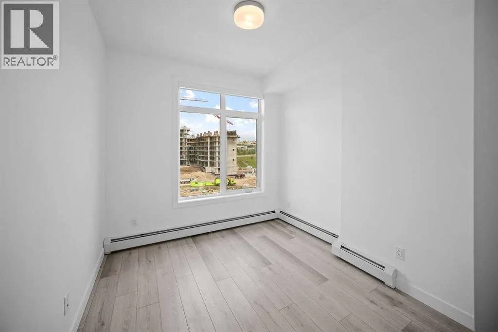 403, 205 Spring Creek Common SW