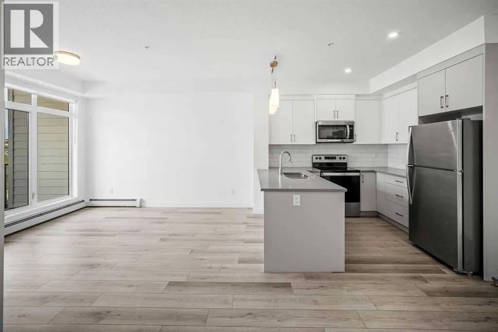 403, 205 Spring Creek Common SW