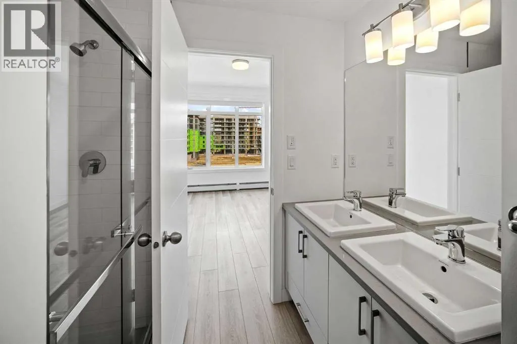 403, 205 Spring Creek Common SW