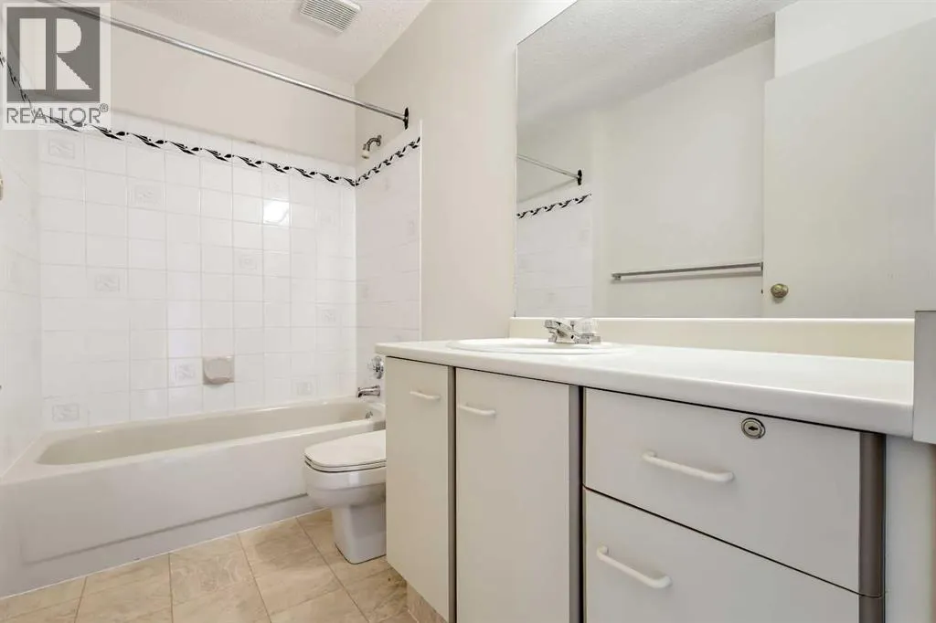 77, 5810 Patina Drive SW
