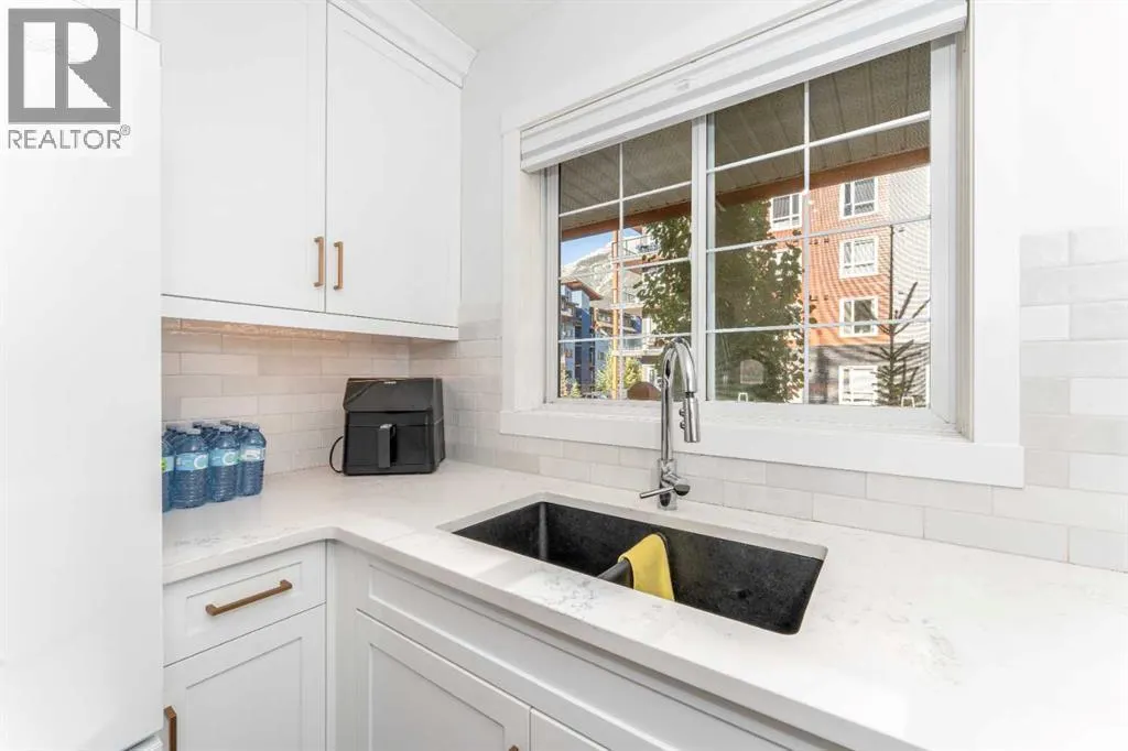 205, 112 Kananaskis Way