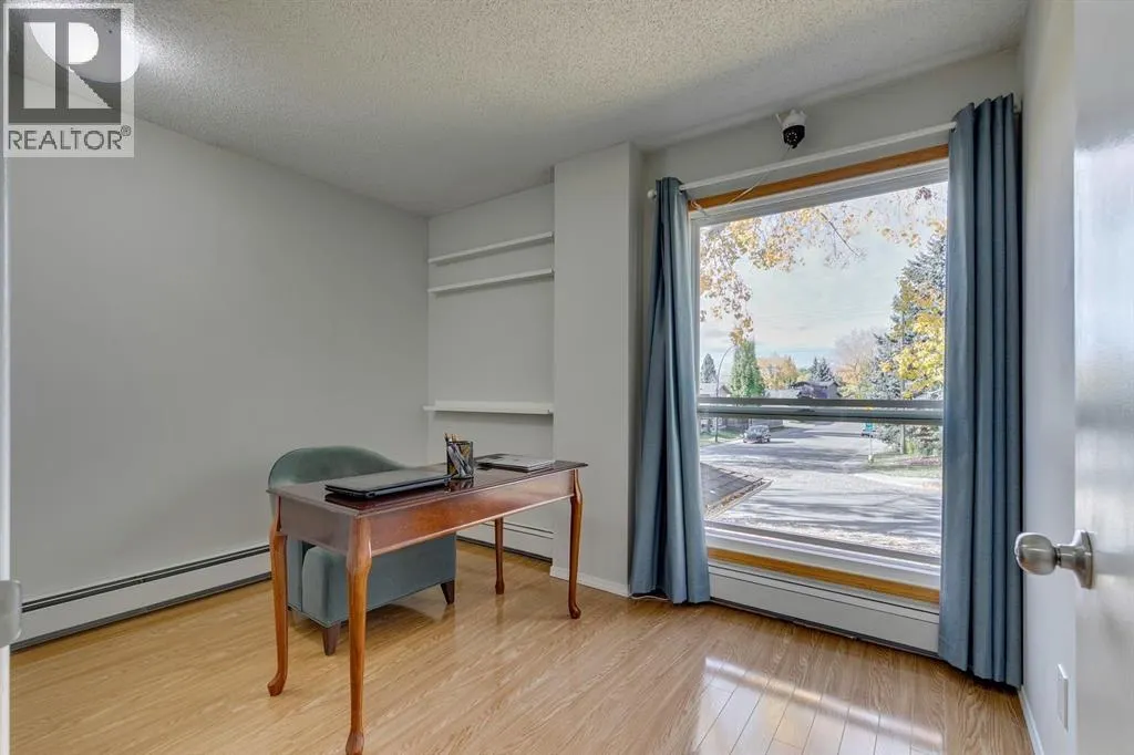 121, 860 Midridge Drive SE