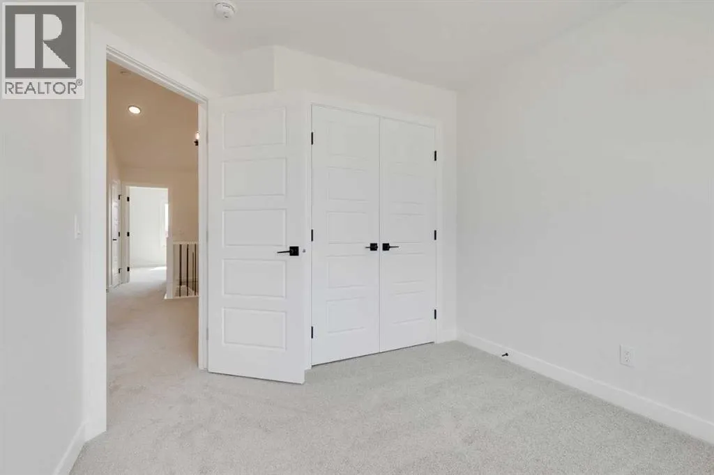 612 Buffaloberry Manor SE