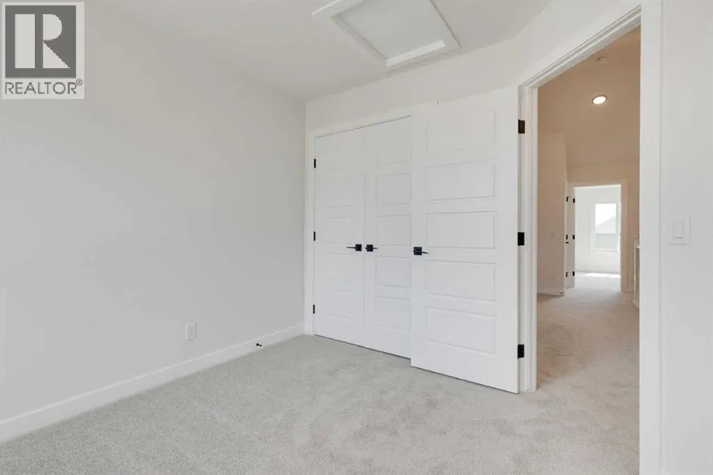 612 Buffaloberry Manor SE