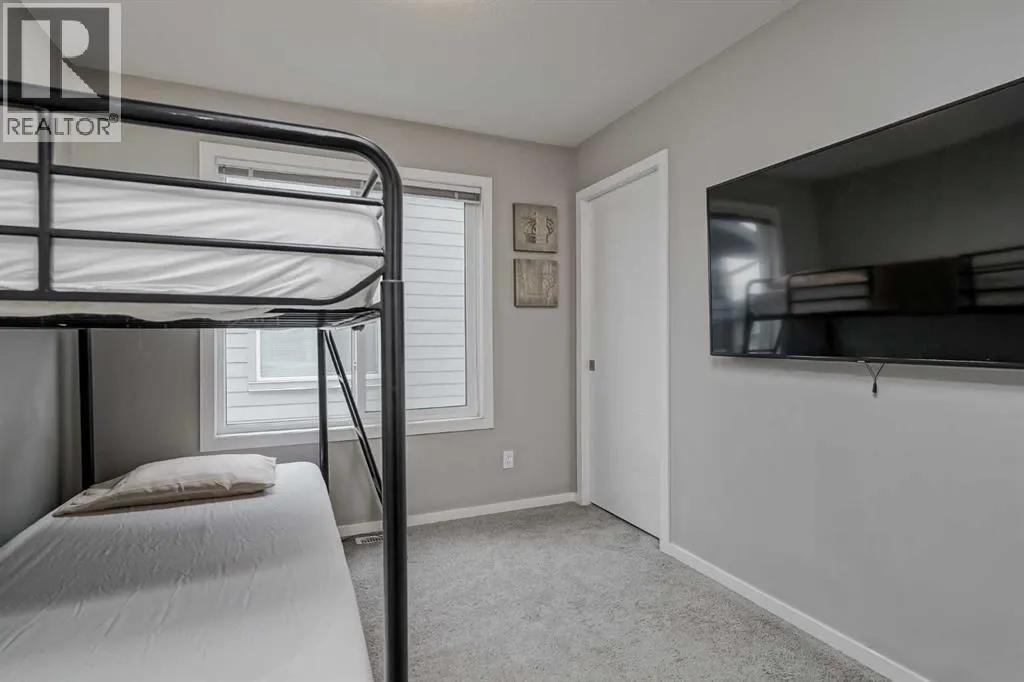 203, 130 Redstone Walk NE