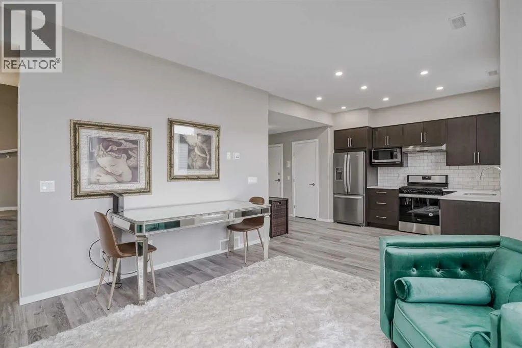 203, 130 Redstone Walk NE