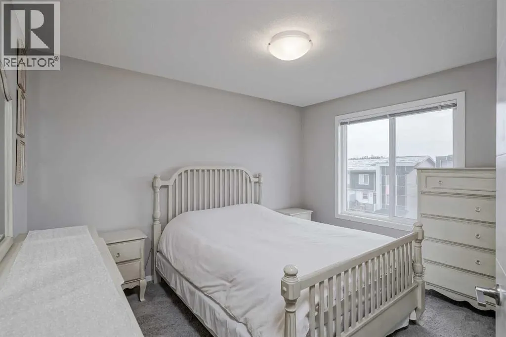 203, 130 Redstone Walk NE