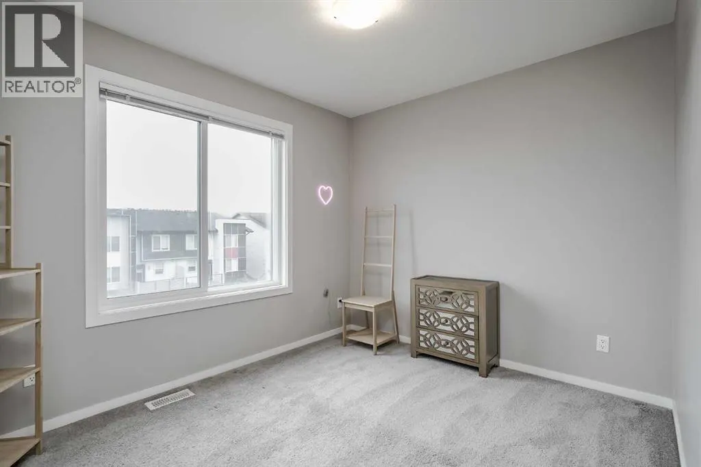 203, 130 Redstone Walk NE