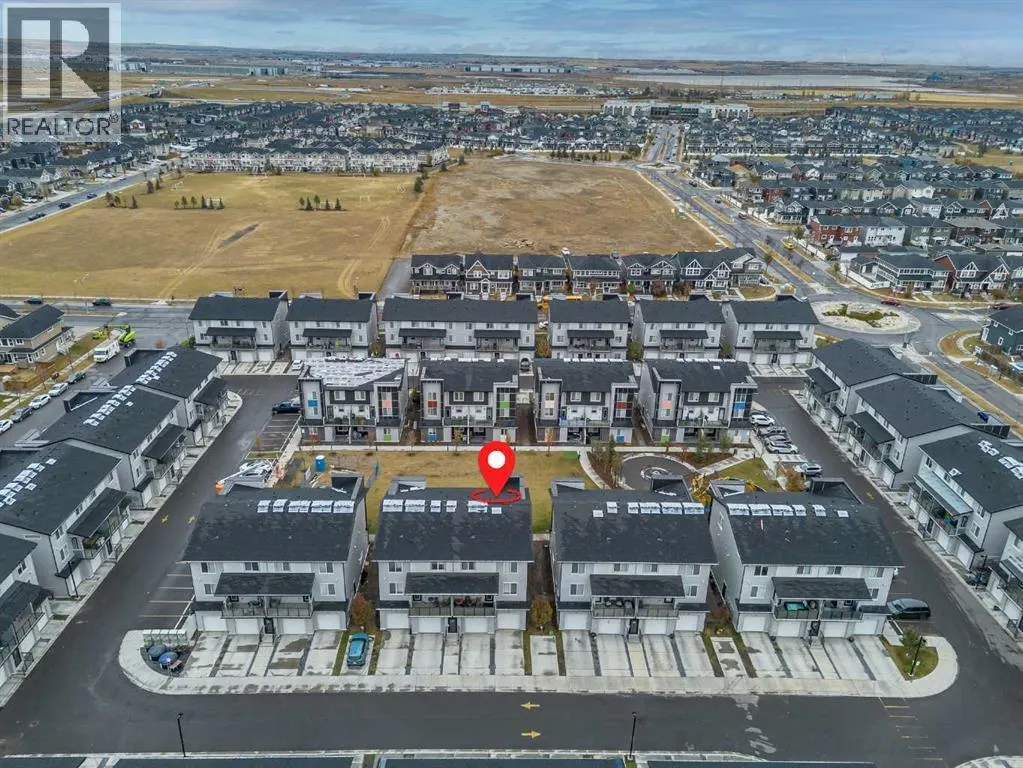 203, 130 Redstone Walk NE